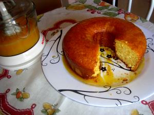 Quantas calorias em 1 Porçoes Bolo De Laranja Com Calda?