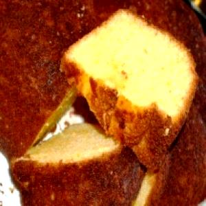 Quantas calorias em 1 Porçoes Bolo De Laranja Sem Ovo?