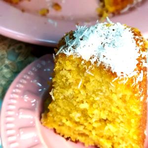 Quantas calorias em 1 Porçoes Bolo De Milho E Coco?