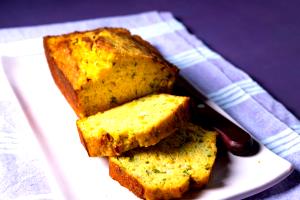 Quantas calorias em 1 Porçoes Bolo Salgado De Milho?