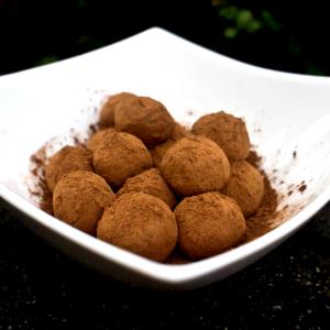 Quantas calorias em 1 Porçoes Brigadeiro Com Cacau Em Pó?