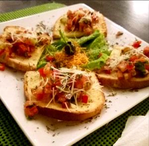 Quantas calorias em 1 Porçoes Bruschetta?