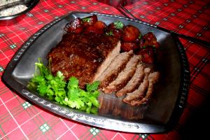 Quantas calorias em 1 Porçoes Carne Assada De Panela?