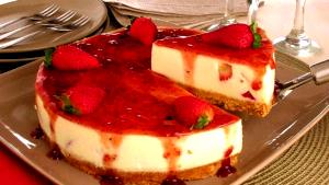 Quantas calorias em 1 Porçoes Cheescake De Morango?