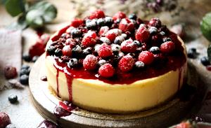 Quantas calorias em 1 Porçoes Cheese Cake De Frutas Vermelhas?