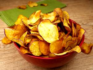 Quantas calorias em 1 Porçoes Chips De Batata Doce?
