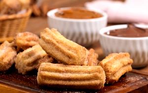 Quantas calorias em 1 Porçoes Churros De Pão Integral?