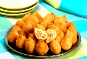 Quantas calorias em 1 Porçoes Coxinha Assada?