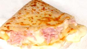 Quantas calorias em 1 Porçoes Crepe De Presunto E Queijo?