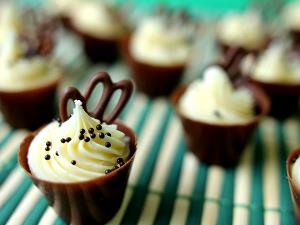 Quantas calorias em 1 Porçoes Cupcake Chocolate Com Trufa De Maracujá?