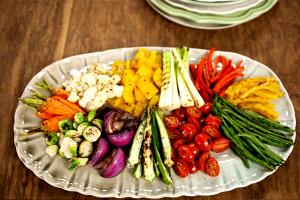 Quantas calorias em 1 Porçoes Ely Legumes Grelhados?