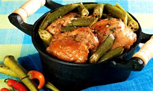 Quantas calorias em 1 Porçoes Frango A Mineira?