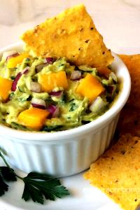 Quantas calorias em 1 Porçoes Guacamole Con Mango?