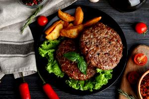 Quantas calorias em 1 Porçoes Hamburguer Caseiro Carne E Legumes?