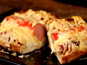 Quantas calorias em 1 Porçoes Hot Dog Assado?