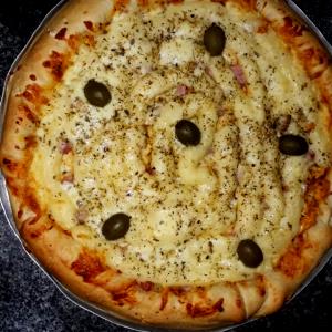 Quantas calorias em 1 Porçoes Massa Pizza Mondial?