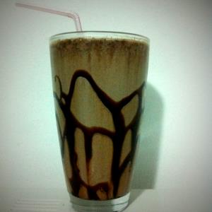 Quantas calorias em 1 Porçoes Milkshake De Ovomaltine Caseiro?