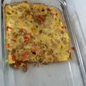 Quantas calorias em 1 Porçoes Omelete Com Atum E Mussarela?