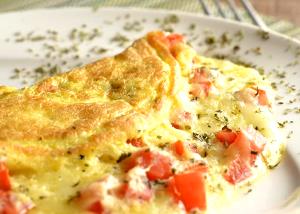 Quantas calorias em 1 Porçoes Omelete Com Mussarela E Tomate?