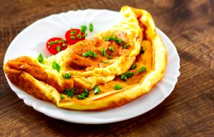 Quantas calorias em 1 Porçoes Omelete De Legumes E Queijo Minas?