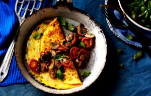 Quantas calorias em 1 Porçoes Omelete De Tomate Com Cogumelos?