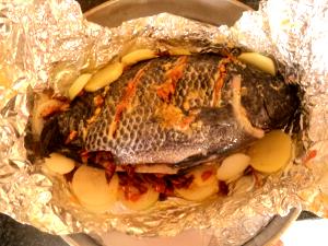 Quantas calorias em 1 Porçoes Peixe Baiano?