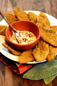 Quantas calorias em 1 Porçoes Peixinho-Da-Horta Empanado No Forno?