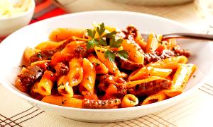 Quantas calorias em 1 Porçoes Penne Integral Com Alcatra?