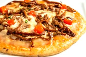 Quantas calorias em 1 Porçoes Pizza De Aliche?