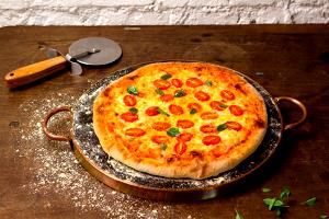 Quantas calorias em 1 Porçoes Pizza De Forno?