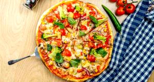 Quantas calorias em 1 Porçoes Pizza Integral Proteica?
