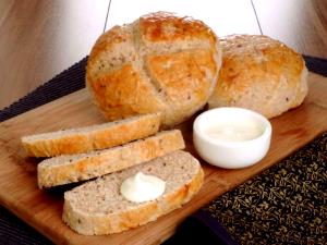Quantas calorias em 1 Porçoes Pão Com Aveia E Linhaça?