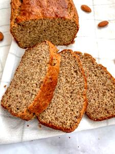 Quantas calorias em 1 Porçoes Pão De Amendoas Sem Gluten?