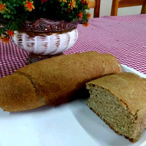 Quantas calorias em 1 Porçoes Pão De Farinha Integral E Aveia?