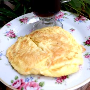 Quantas calorias em 1 Porçoes Pão De Queijo De Frigideira Da Joice?