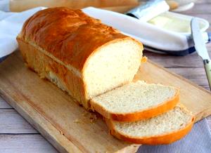 Quantas calorias em 1 Porçoes Pão Forma Caseiro?