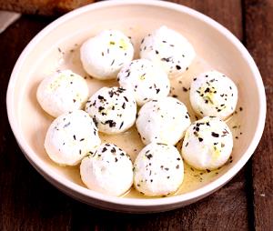 Quantas calorias em 1 Porçoes Queijo Labneh Caseiro?