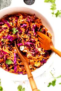 Quantas calorias em 1 Porçoes Quinoa Carrot Slaw?