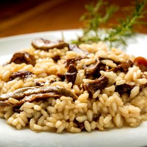 Quantas calorias em 1 Porçoes Risoto De Carne-Seca?