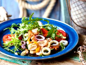 Quantas calorias em 1 Porçoes Salada De Frutos Do Mar?