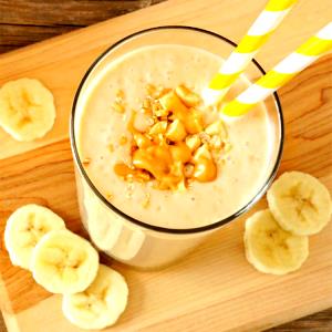 Quantas calorias em 1 Porçoes Smoothie De Banana Com Pasta De Amendoim?