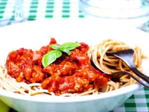Quantas calorias em 1 Porçoes Spaghetti Integral À Bolonhesa?