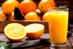 Quantas calorias em 1 Porçoes Suco De Laranja Caseiro?