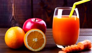 Quantas calorias em 1 Porçoes Suco De Maça Com Laranja?