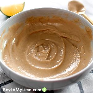 Quantas calorias em 1 Porçoes Tahini Lime Dressing?