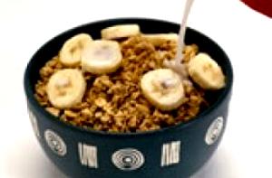 Quantas calorias em 1 Porçoes Tigela De Banana E Granola?