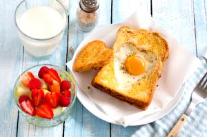 Quantas calorias em 1 Porçoes Torradas Com Ovos?