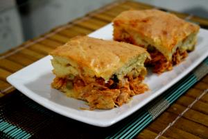 Quantas calorias em 1 Porçoes Torta De Frango Keli?