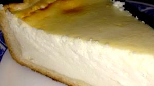Quantas calorias em 1 Porçoes Torta De Requeijão ( Cream Cheese)?