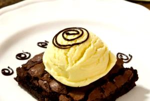Quantas calorias em 1 unidade (80 g) Brownie de Chocolate com Nozes?